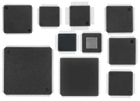 Microcircuits with legs on the sides, processors, electronic components on a white background isolatedの写真素材