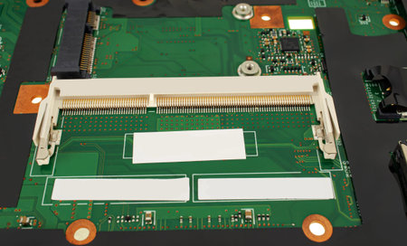 electrical circuit from a laptop, with a connector for RAM, close-up