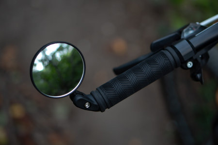 bicycle rear view mirror, attached to the handlebars of the bicycleの写真素材