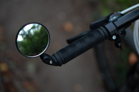 bicycle rear view mirror, attached to the handlebars of the bicycleの写真素材