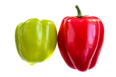 Two red and green sweet peppers isolated on white backgroundの写真素材