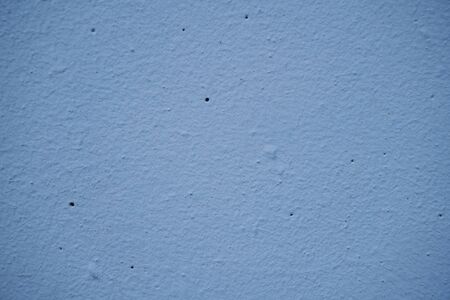 Blue painted concrete wall background. Blue concrete wall texture.の写真素材
