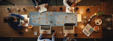 several business people working together on a tableの素材