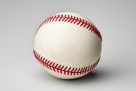 white baseball ball isolated on whiteの素材