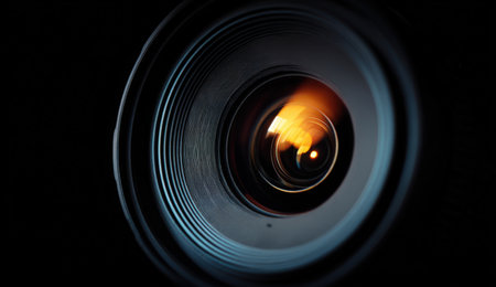Close-up of camera lens, highlighting intricate details and reflections, capturing light and colors, illustrating the essence of photography and visual storytellingの素材