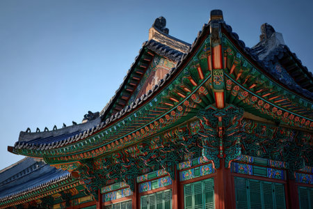 Architectural masterpiece with detailed roof design, vibrant colors, and intricate carvings, highlighting the rich cultural heritage and artistry of traditional Asian buildingsの素材