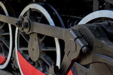 Railroad wheel dark and red. Vintage train wheels.の写真素材