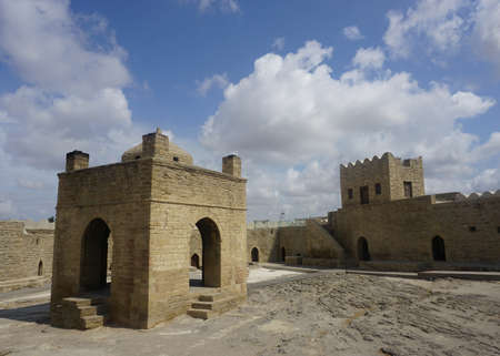 Ateshgah Zoroastrian Fire Temple Courtyard with Blue Sky on Backgroundのeditorial素材