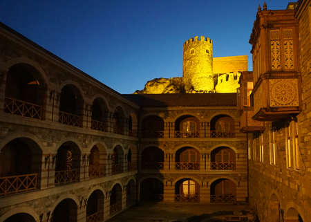 Akhaltsikhe Rabati Castle Fortress Complex View of Illuminated Tower at Evening from Small Courtyardのeditorial素材