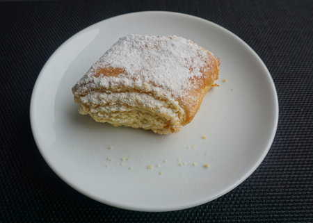 Georgian Traditional Qada Dessert with Sprinkled Sugar on a Plate