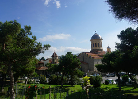 Gori Holy Archangels Orthodox Church Common View with Blue Sky from Park