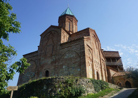 Gremi Monastery Castle Church Gate Entrance View with Sign and Wall