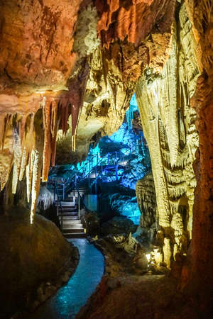 Stalactites Interior View of Prometheus Cave with Blue Lightsの写真素材