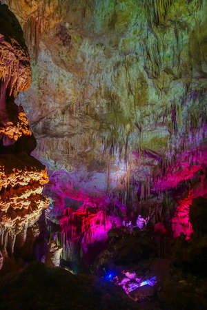 Stalactites Interior View Prometheus Cave with Purple Lightsの写真素材