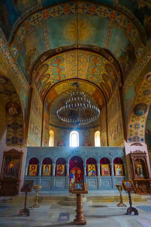 Shiomgwime Monastery Church Iconostasis View with Icons and Light Chandelierのeditorial素材