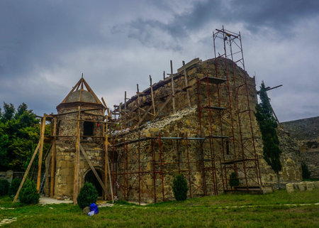 Zedazeni Monastery Under Construction at Summer with Rainy Clouds