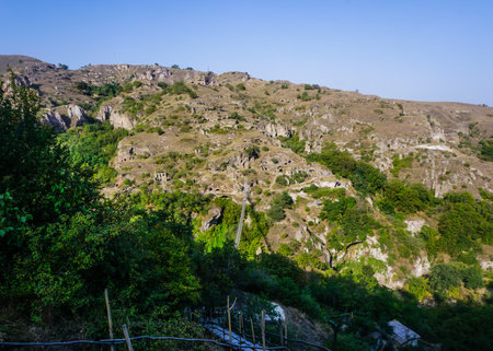Goris Khndzoresk Hanging Bridge with Landscape of Ancient Cave Settlementの写真素材