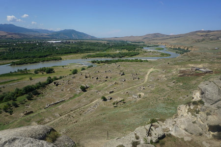 Uplistsikhe Fortress and Housing Ruins with River Forest and Landscape View