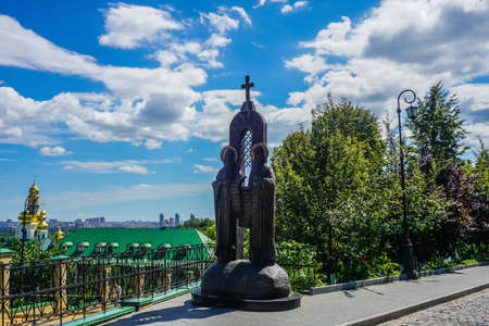 Kiev Great Lavra Saints Anthony and Theodosius Statue with Blue Sky Backgroundsの写真素材
