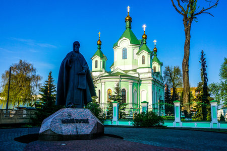 Brest Saint Simeon Cathedral with St Athanasius Brestskiy Statue and Clean Blue Sky Background