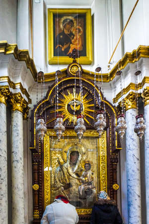 Minsk Holy Spirit Cathedral Praying in Front of the Icon of the Theotokos of Godのeditorial素材