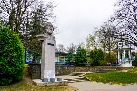 Minsk Gorky Park Bust of Konstantin Tsiolkovskiy with Cloudy Sky Backgroundの写真素材
