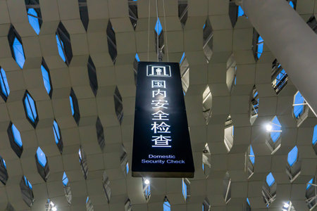 Airport White Colored Domestic Security Check Sign in English and Chinese on Black Board