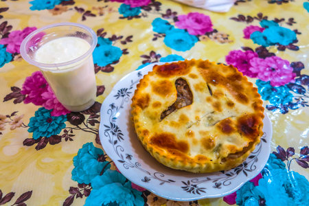 Turkmenistan Cuisine Lamb Onion Fitchi with a Glass of Kefirの写真素材