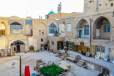 Kashan Grand Bazaar Aminoddole Carvansarai Courtyard with a Wood Carving Window Storeのeditorial素材