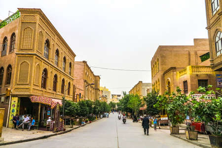 Kashgar Old Town Leading Lines Common Street with Walking People and Uyghur Architecture Buildingsのeditorial素材