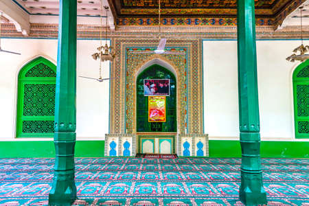 Kashgar Id Kah Mosque Green Colored Columns with Carpets for Outdoor Prayers and Mihrabのeditorial素材