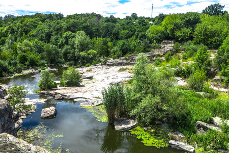 Buky Village Canyon at Hirskyi Tikych River with Rocky Shores and Forest