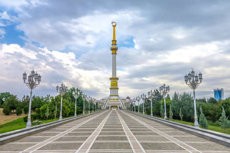 Ashgabat Independence Monument Back View with Cloudy Skyのeditorial素材
