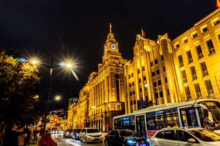 Shanghai The Bund Promenade Commercial Buildings at Night with Cars Traffic Jamのeditorial素材