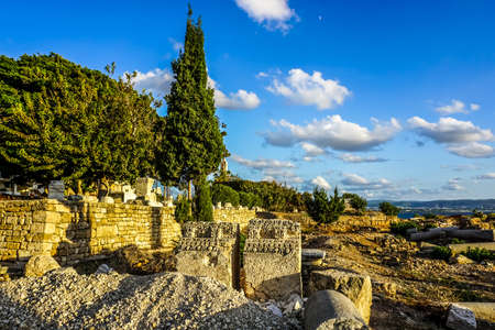 TyreSite Ruins with Trees and Sunset Blue Sky Background Viewの写真素材