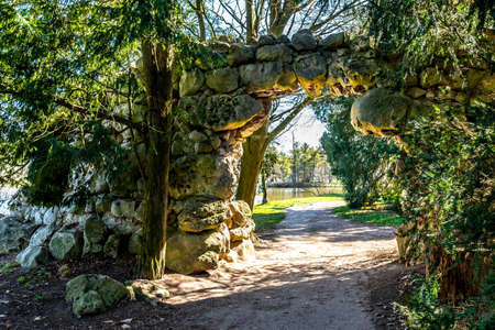 Lednice Valtice Cultural Landscape Area Complex Garden with Stone Bow Portal with Hiking and Bicycle Track in Springのeditorial素材