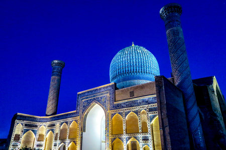 Samarkand Gur-e Amir Complex Mausoleum Cupola Minaret Side Viewpoint at Nightの写真素材