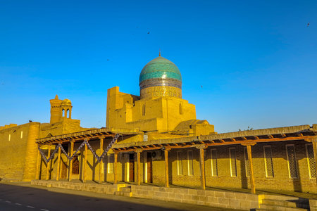 Bukhara Old City Kalon Minor Minaret Po-i-Kalyan Mosque Dome at Sunset