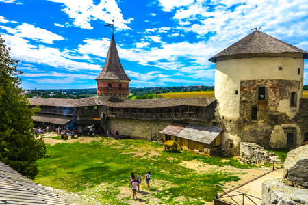 Kamianets Podilskyi Ancient Fortress Castle Courtyard with Watchtowers and Cloudy Sky Backgroundのeditorial素材