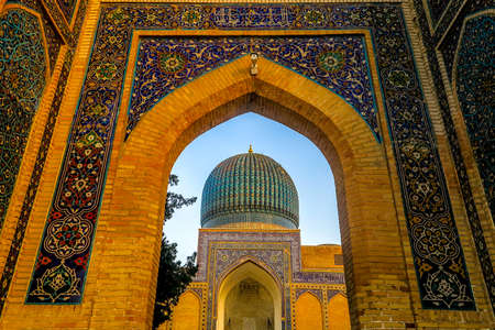 Samarkand Gur-e Amir Complex Mausoleum Main Gate Entrance View Iwan Cupola at Sunsetのeditorial素材