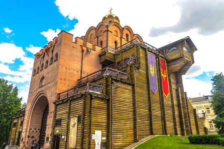 Kiev Golden Gate Zoloti Vorota Side View with Ukrainian Coat of Arm Depicted on Two Flags