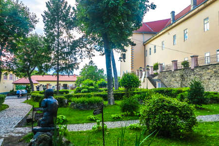 Uzhhorod Castle Citadel Interior Garden Courtyard Building with Statue of a Man Suffocating a Snakeのeditorial素材