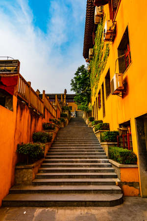 Nanjing Jiming Buddhist Temple Leading Lines Upstairs Low Angle View at Afternoon Sunsetの写真素材