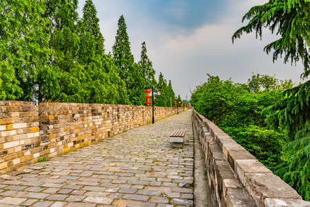 Nanjing Chengqiang Ming City Wall Leading Lines During of the Wall Road with Chinese Lanterns Afternoon Sunsetのeditorial素材