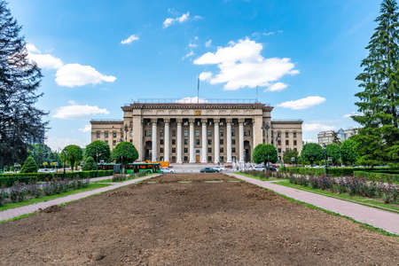 Almaty Kazakh-British Technical University Frontal View from Park on Astana Square on a Sunny Blue Sky Dayの写真素材