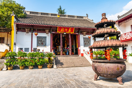 Wuhu Anhui Guangji Buddhist Monastery Temple Hall of Bhaisajyaguru Frontal View on a Sunny Blue Sky Dayのeditorial素材