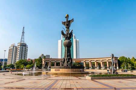 Wuhu Anhui Jiuzi Square View of Phoenix Sculpture Surrounded by Fountains near Buxingjie Pedestrian Road on a Sunny Blue Sky Dayのeditorial素材