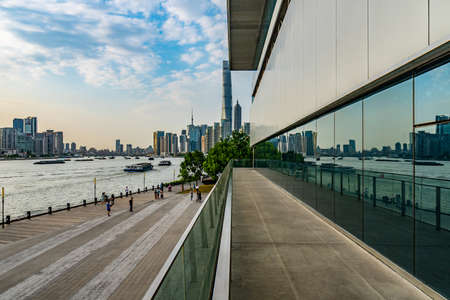 Shanghai Huangpu River Picturesque Leading Lines View of Promenade at Shanghai MOCA Museum of Contemporary Art During Sunsetのeditorial素材