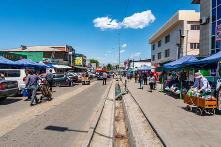 Taldykorgan Kok Bazar Green Bazaar Main Shopping Daraboz-Ana Street on a Sunny Blue Sky Dayのeditorial素材