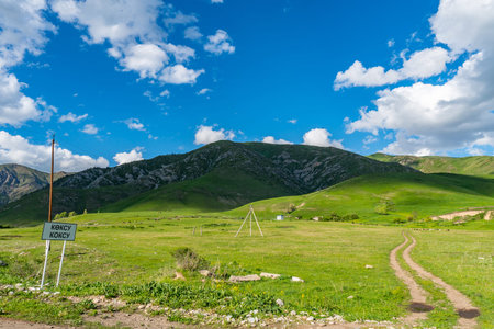 Rudnichny Koksu Karatal River Valley Breathtaking Picturesque View of P125 Highway on a Sunny Blue...